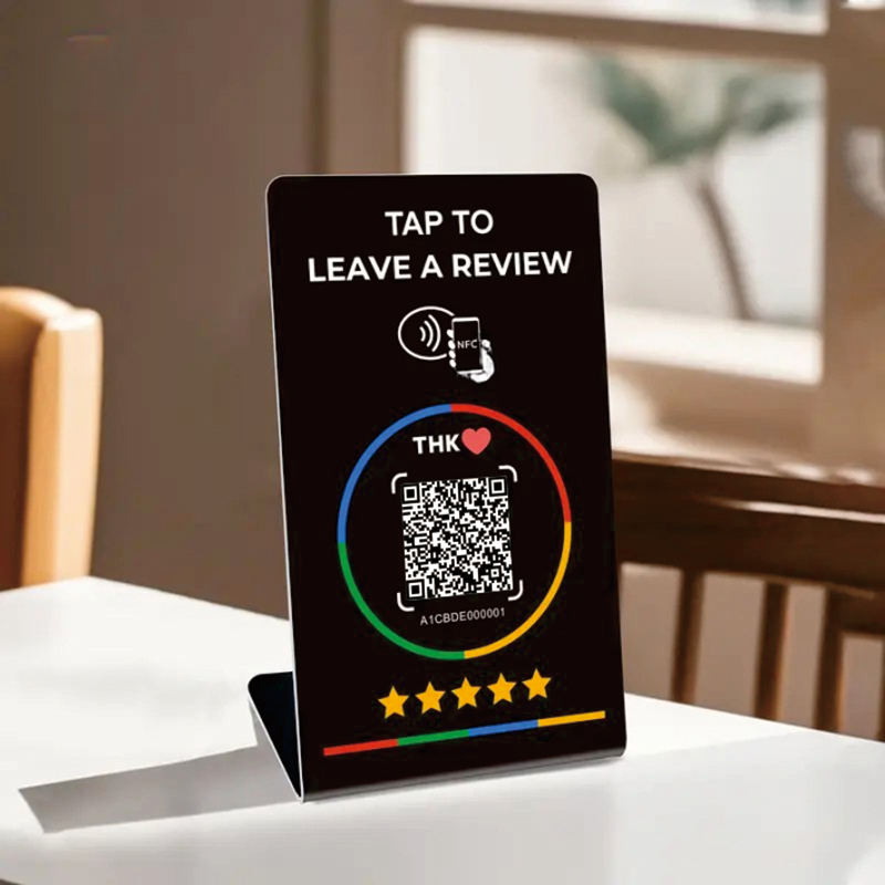 Premium NFC Google Review Card stand displayed on a café table with a tap-to-review QR code